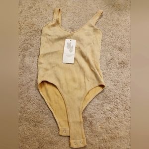 NWT Aura M/L yellow ribbed bodysuit